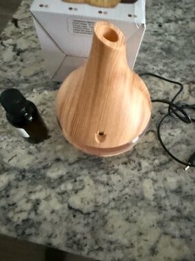 Wood Grain Essential Oil Diffuser - Natural Wood Finish with bottle of oil
